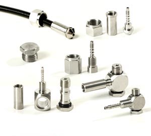 Self-assembly swageable fittings
